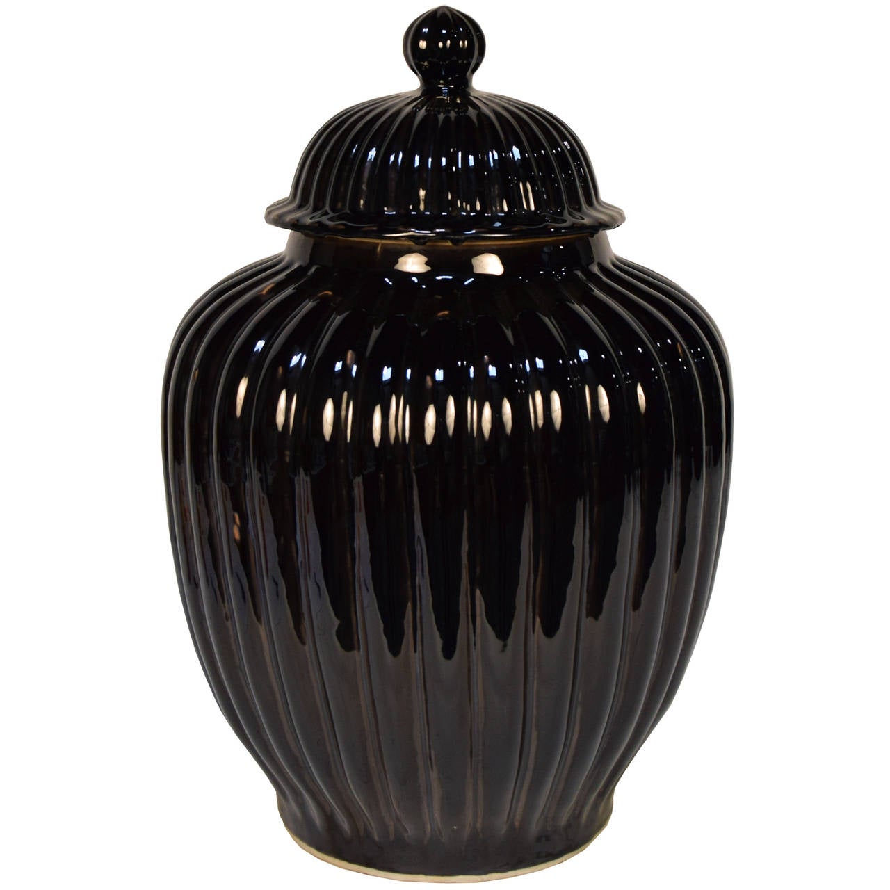 Ceramic black glazed ribbed melon shaped jar with lid from Beijing, China.