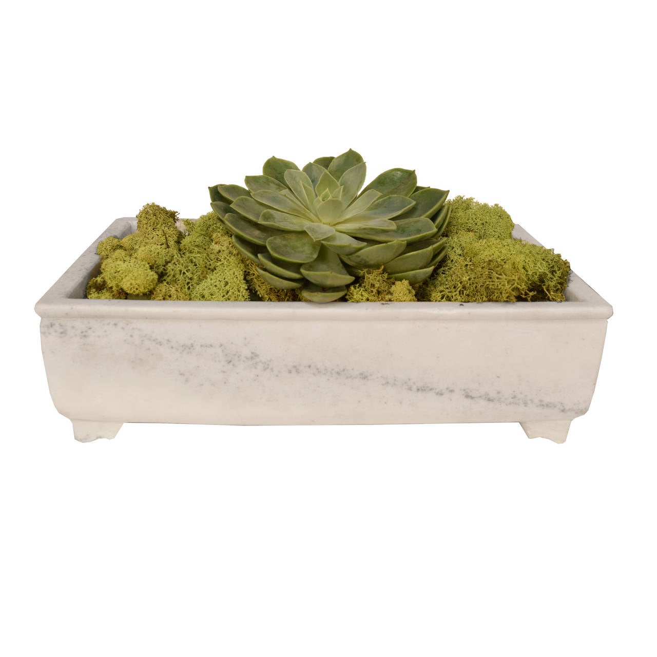 A petite marble trough from Shanxi Province, China with a beveled lip, rounded edges and four feet.

 