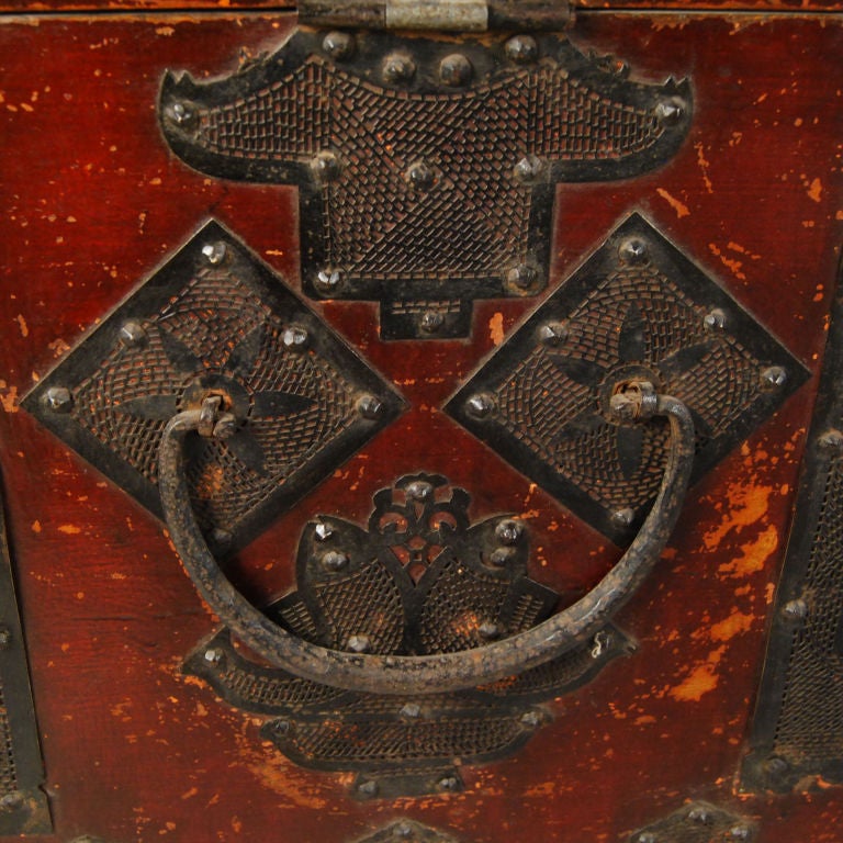A 19th century provincial Korean blanket chest with elaborate pierced iron hardware.<br />
<br />
Pagoda Red Collection #:  T011<br />
<br />
<br />
Keywords:  Chest, dresser, console, sofa table, night stand, bedside, end, side