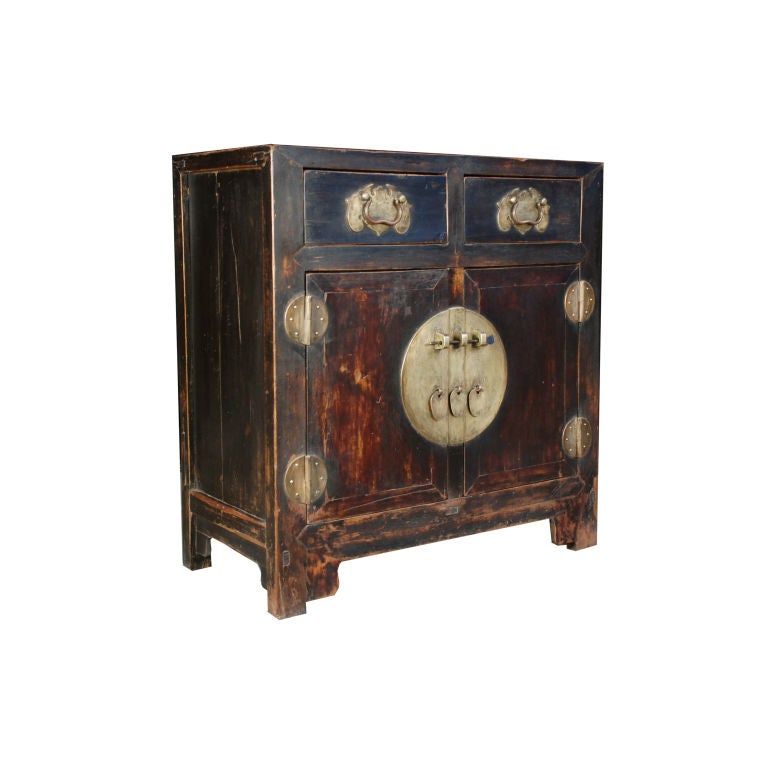 A 19th century Chinese camphor chest with two drawers and two doors with brass hardware.<br />
<br />
Pagoda Red Collection #:  Z046<br />
<br />
<br />
Keywords:  Chest, commode, dresser, console, sideboard, buffet, server, credenza