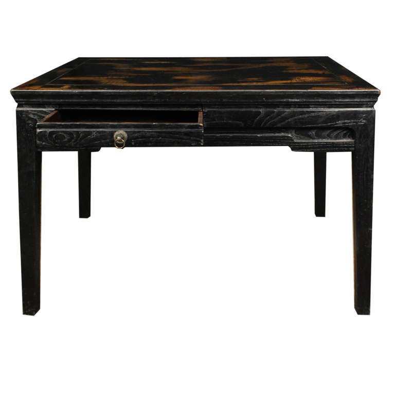 A black reading table from Shandong Province, China with a beautiful top. This table has two drawers on two different ends of the table. It is made of Northern Chinese Elm and is from circa 1900. 

Pagoda Red Collection # CMH607