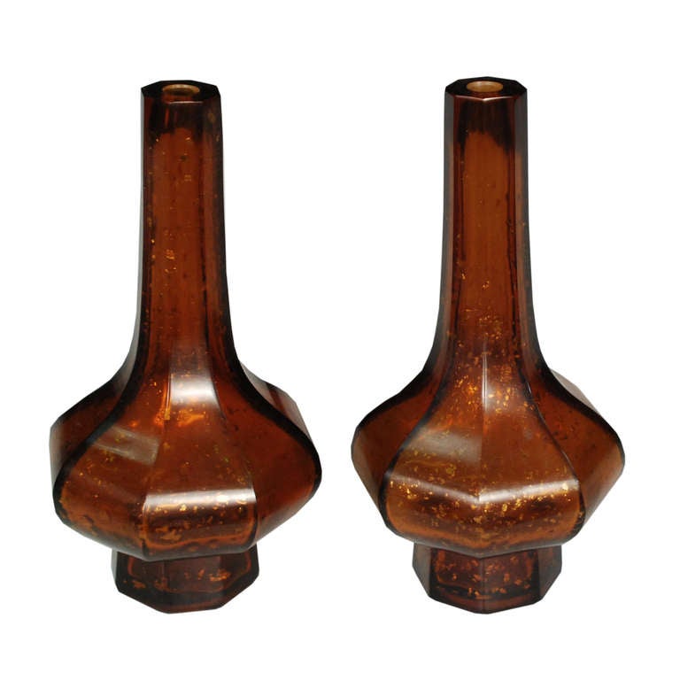 A pair of oxblood Peking glass bud vases from Beijing, China around the 1930's.

Pagoda Red Collection # BJCC012