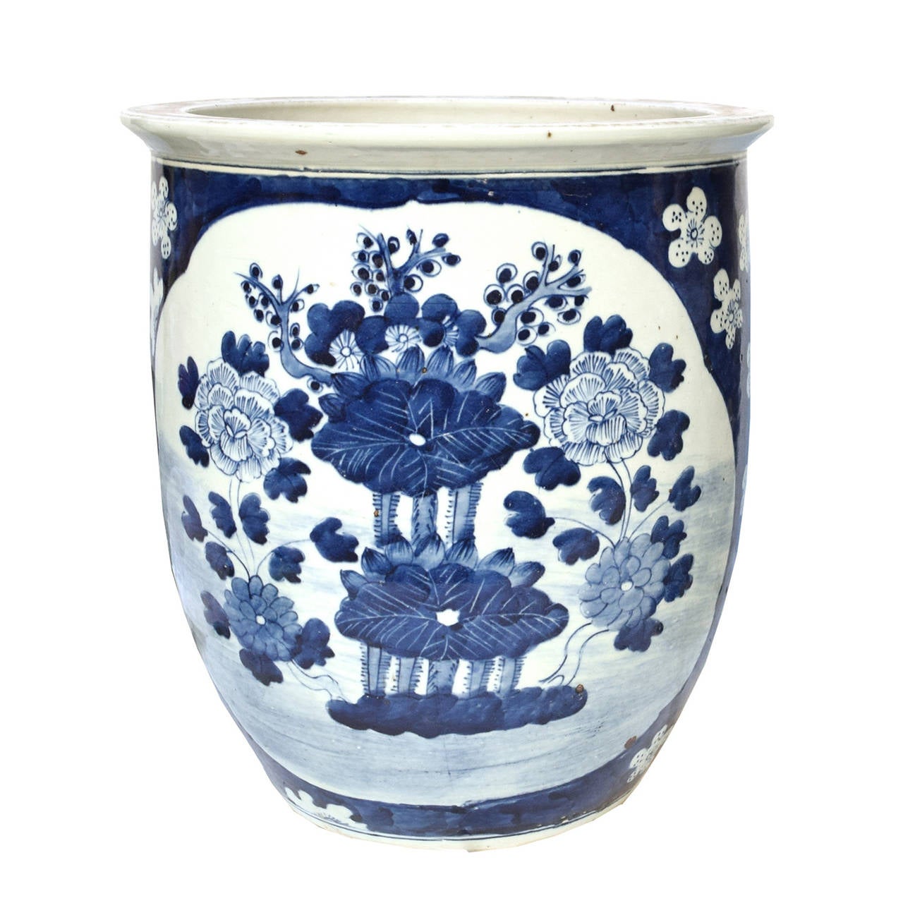 Pair of hand painted blue and white scroll pots from Beijing, China with a floral motif.

Pagoda Red Collection # BJCC056