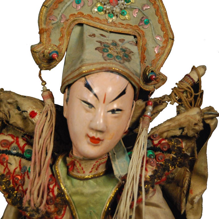 A 19th century Chinese opera marionette puppet with finely carved and painted face, with silk embroidered and sequined costume.<br />
<br />
Pagoda Red Collection #:  DVC012<br />
<br />
<br />
Keywords:  Puppet, opera, China, Chinese, doll,