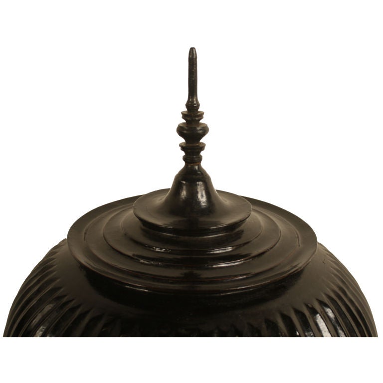 A 19th century Burmese black lacquer offering vessel with three legs and a red lacquered interior.<br />
<br />
Pagoda Red Collection #:  CB231<br />
<br />
<br />
Keywords:  Bowl, tray, box, trunk, statue, sculpture