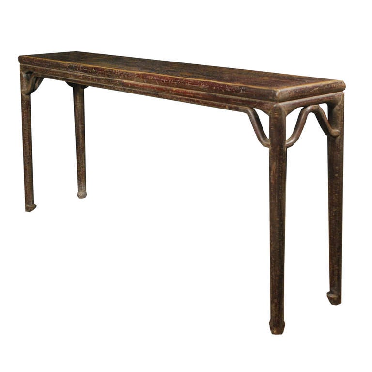 An altar table from Northern China with a lovely lacquer patina. This circa 1850 shallow table features curved stretchers and hoofed feet.

Pagoda Red Collection # BJC082