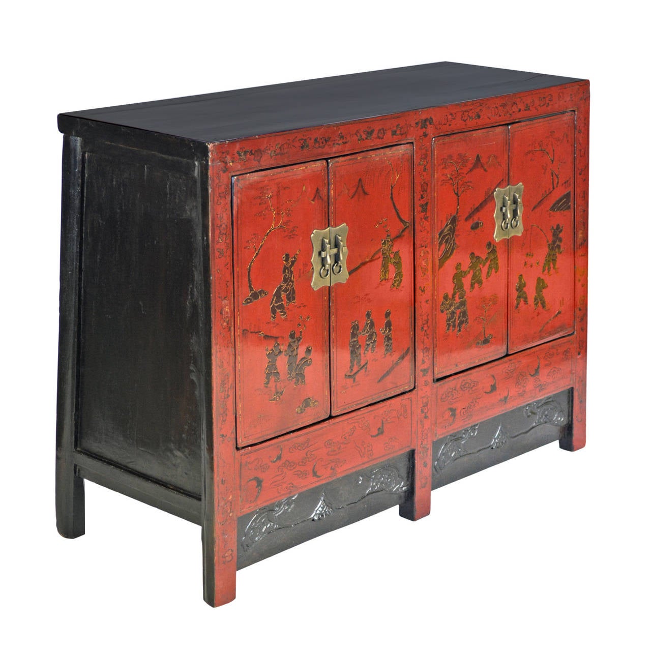 This square corner Linden wood sideboard is lacquered with red and black finishes. The doors are painted with figures of little boys symbolizing fertility. The apron is has a black lacquer finish creating a contrast in color.