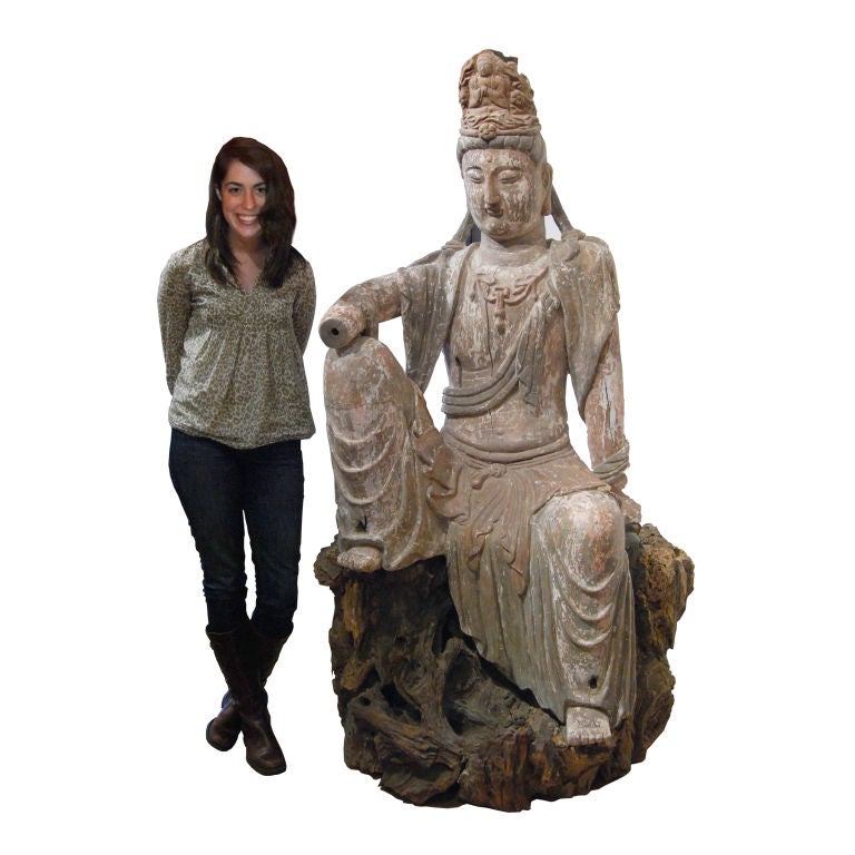 An 18th century Chinese carved and gessoed Bodhisattva figure seated on an organic wooden base.<br />
<br />
Pagoda Red Collection #:  CPG001<br />
<br />
<br />
Keywords:  Figure, statue, sculpture, Buddha, Buddhist
