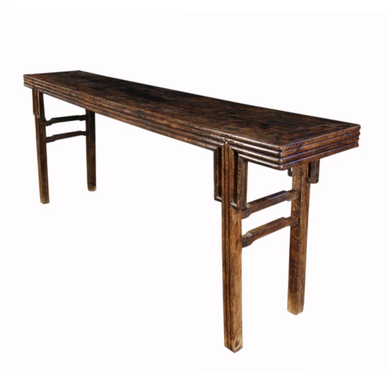 An early 19th century Chinese walnut altar with Ming-inspired form including simple spandrels and beaded 