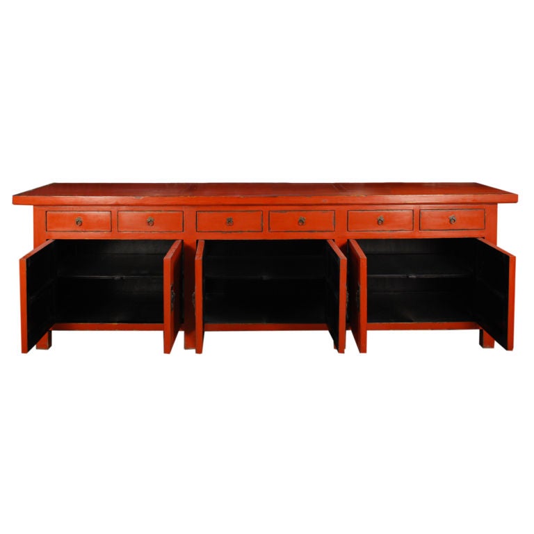 An early 20th century Chinese red lacquer six drawer six door coffer with brass hardware.

Pagoda Red Collection #:  Z178

Keywords:  Coffer, console, sideboard, server, buffet, credenza, sofa table
