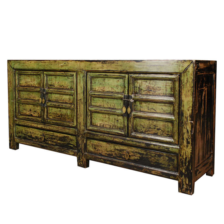 A two door two drawer coffer from Mongolia. This circa 1900 coffer features brass hardware and a unique lacquered patina.

Pagoda Red Collection # BJC129