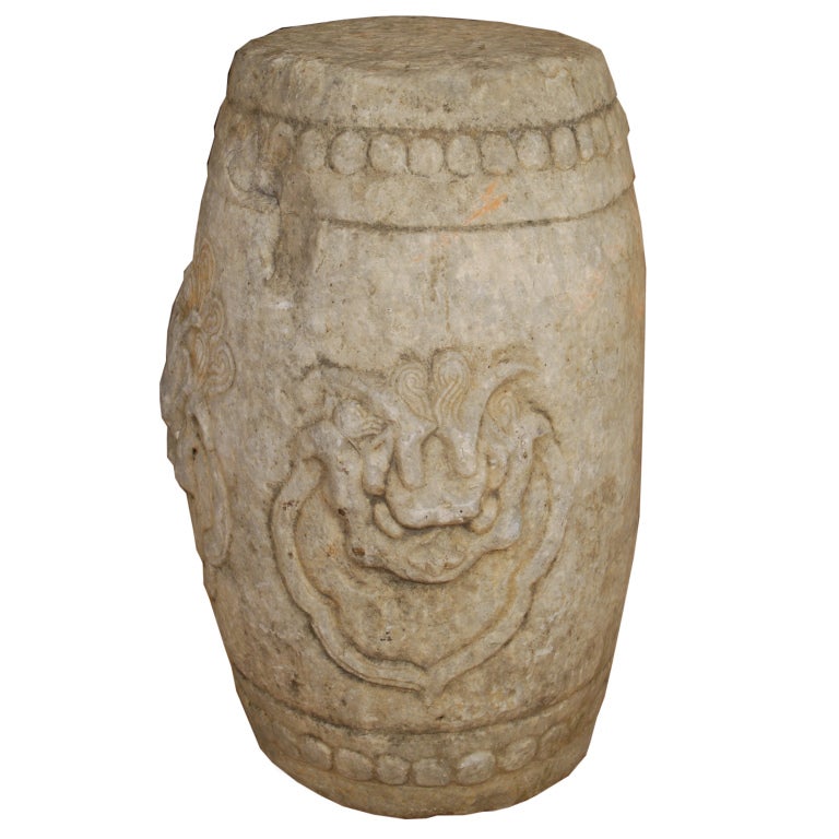 An 18th century Chinese marble drum-form garden stool carved with fierce protective lions.<br />
<br />
Pagoda Red Collection #:  BJA020<br />
<br />
<br />
Keywords:  Garden stool, side table, end, stool, bench, seating, chair