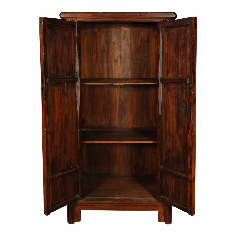 A 19th century Chinese elmwood tapered cabinet with two doors and brass hardware.

Pagoda Red Collection #:  CB471


Keywords:  Cabinet, armoire, linen press, closet, cupboard, kitchen cabinet, pantry