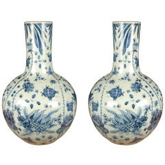 Vintage Pair of Chinese Blue and White Bottle Vases with Fish