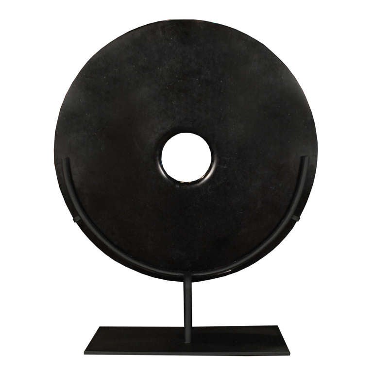 A dramatic black bi disc on a custom steel stand,  a symbol of heaven and wealth.

Pagoda Red Collection # BJCC008I