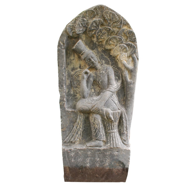 A 20th century Chinese Double-sided carved limestone stele depicting the Buddha seated on a throne surrounded by attendants on one side, and a seated Buddha sleeping under a bodhi tree on the reverse.

Pagoda Red Collection #: 