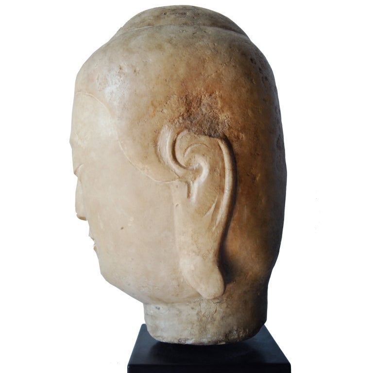 A 19th century Chinese carved white marble Buddha head mounted on custom stand.

Pagoda Red Collection #:  BTE011


Keywords:  Buddha, sculpture, statue, China, Chinese