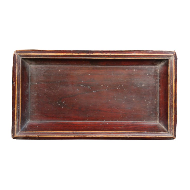 A 19th century Chinese elmwood tray with original 