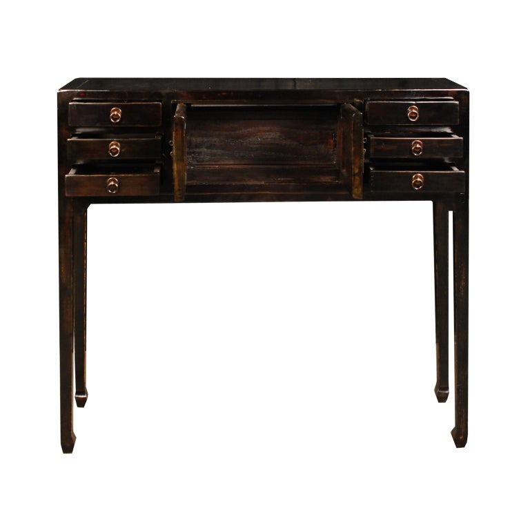 A 19th century Chinese petite black lacquered altar table with six drawers and two doors with brass hardware.

Pagoda Red Collection #:  CAI014


Keywords:  Table, entry, console, sideboard, server, buffet, night stand, bedside