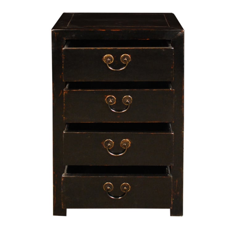 A 19th century Chinese elmwood chest with four drawers and brass hardware.

Pagoda Red Collection #:  CAI013


Keywords:  Chest, dresser, night stand, bedside, end, side table