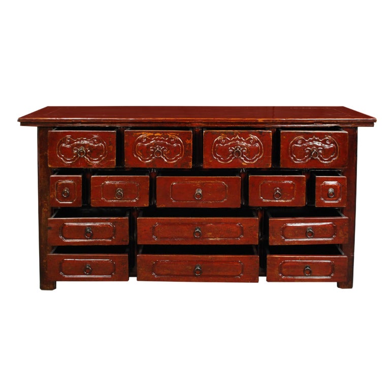 A 19th century Chinese red lacquered coffer with fifteen drawers, four with carved bats, and brass hardware.

Pagoda Red Collection #:  CAI004


Keywords:  Sideboard, buffet, server, credenza, chest of drawers, commode, apothecary, dresser
