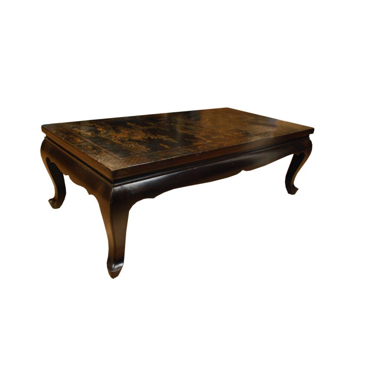 A 19th cenutry Chinese elmwood low table with Mother-of-Pearl inlaid decoration depicting figures at leisure in a garden landscape.  

Pagoda Red Collection #:  CJW002

Keywords:  Table, low, coffee, cocktail
