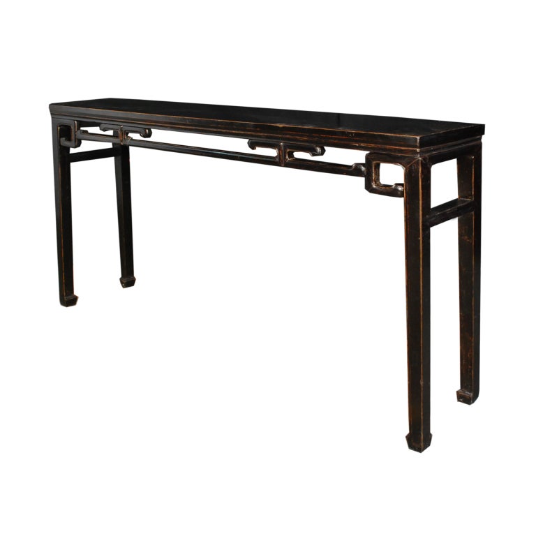 A 19th century Chinese black lacquer altar table simple carved apron and gently tapered legs ending in hoof feet.

Pagoda Red Collection #:  DVD034

Keywords:  Table, console table, sofa table, sideboard, buffet, credenza, server