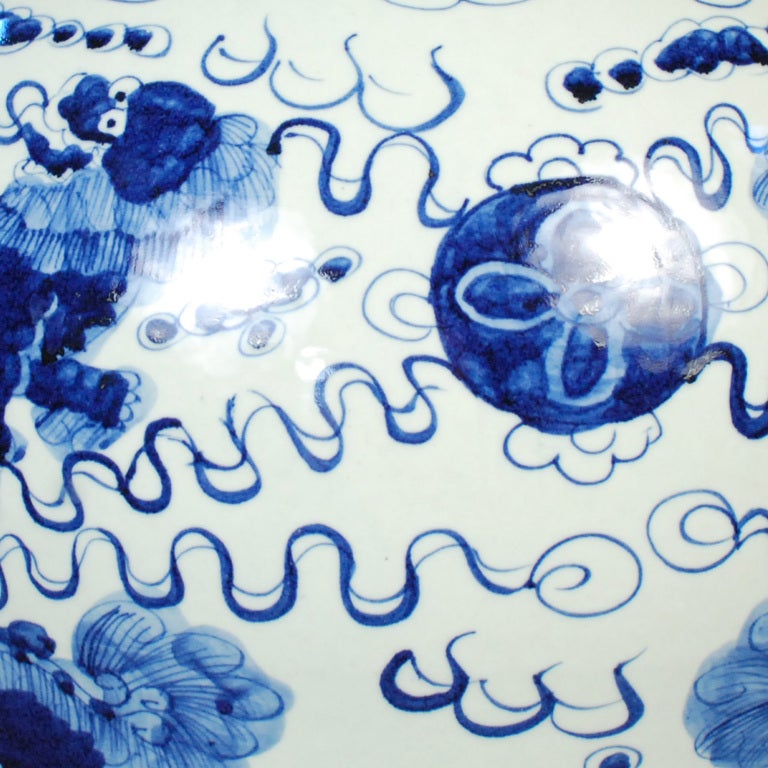 Porcelain Pair of Monumental Blue and White Fu Dog Jars