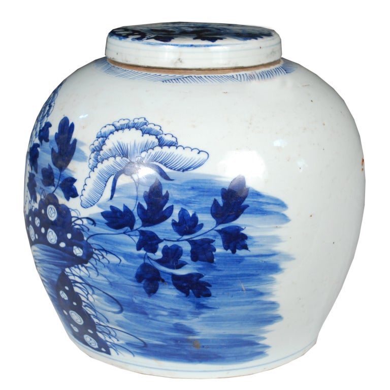A blue and white porcelain ginger jar with lid, painted with peonies in a garden landscape.

Pagoda Red Collection #:  BJAA098A

Keywords:  Vase, bowl, basin, vessel, jar, planter, jardiniere