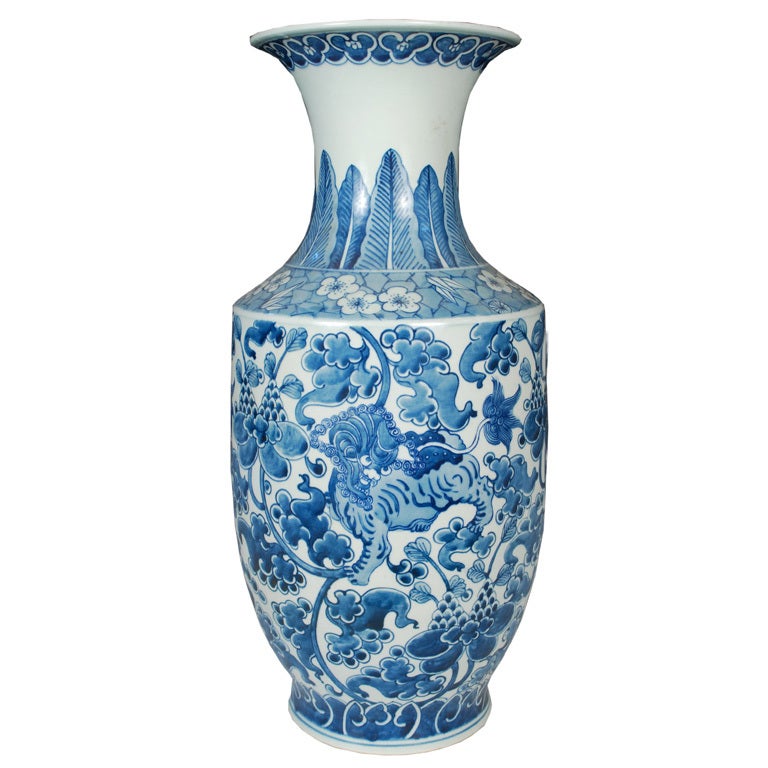 A pair of 20th century Chinese blue and white glazed porcelain phoenix-tail form vases painted with Fu dogs and scrolling vines.

Pagoda Red Collection #:  BJAA100


Keywords:  Vase, urn, vessel, planter, jardiniere