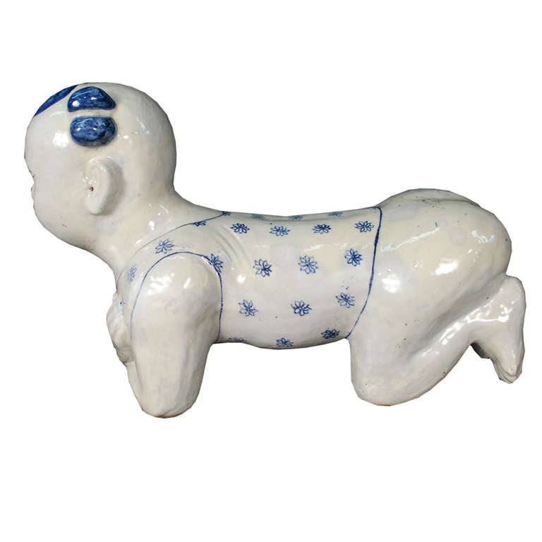 A charming ceramic pillow from China. This piece is from the 1930's and depicts a young boy.

Pagoda Red Collection # CMK027