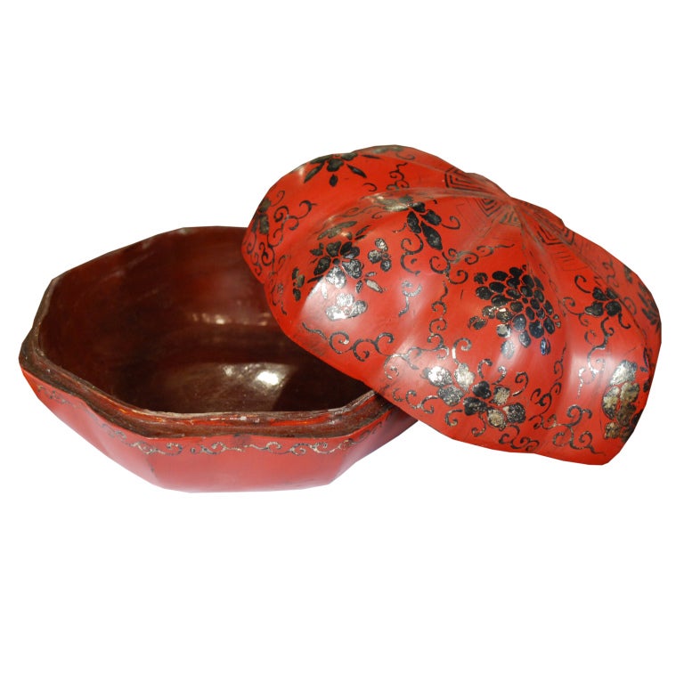 A pair of early 20th century Chinese red lacquered and lotus painted gourd shaped box.