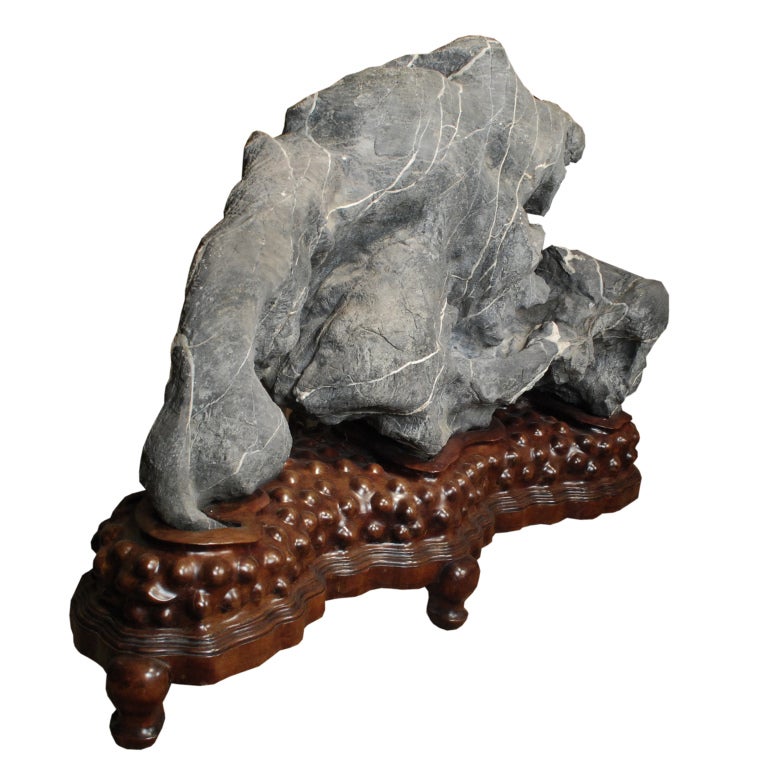 A monumental 19th century Chinese scholars' lingbi stone with a carved bumpy huali base.

Pagoda Red Collection #:  CSM001


Keywords:  Sculpture, statue, scholars object, China, Chinese, garden, courtyard