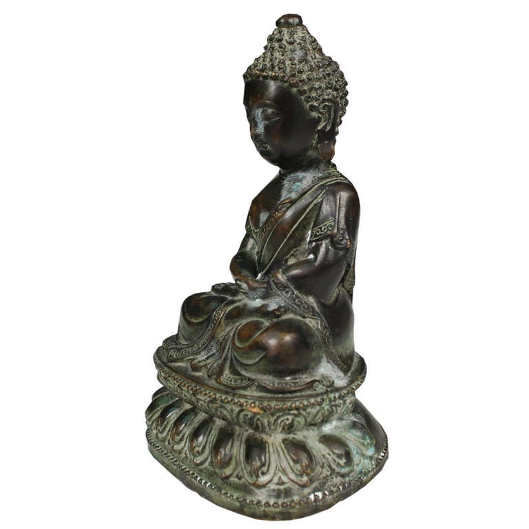 A bronze buddha from Thailand. This buddha is from c. 1900 and stands 6