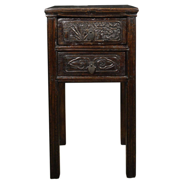 A wonderful pair of carved side tables from Shanxi Province, China. These tables are beautifully carved on all sides and feature two drawers in the front. 

Pagoda Red Collection # BJB023