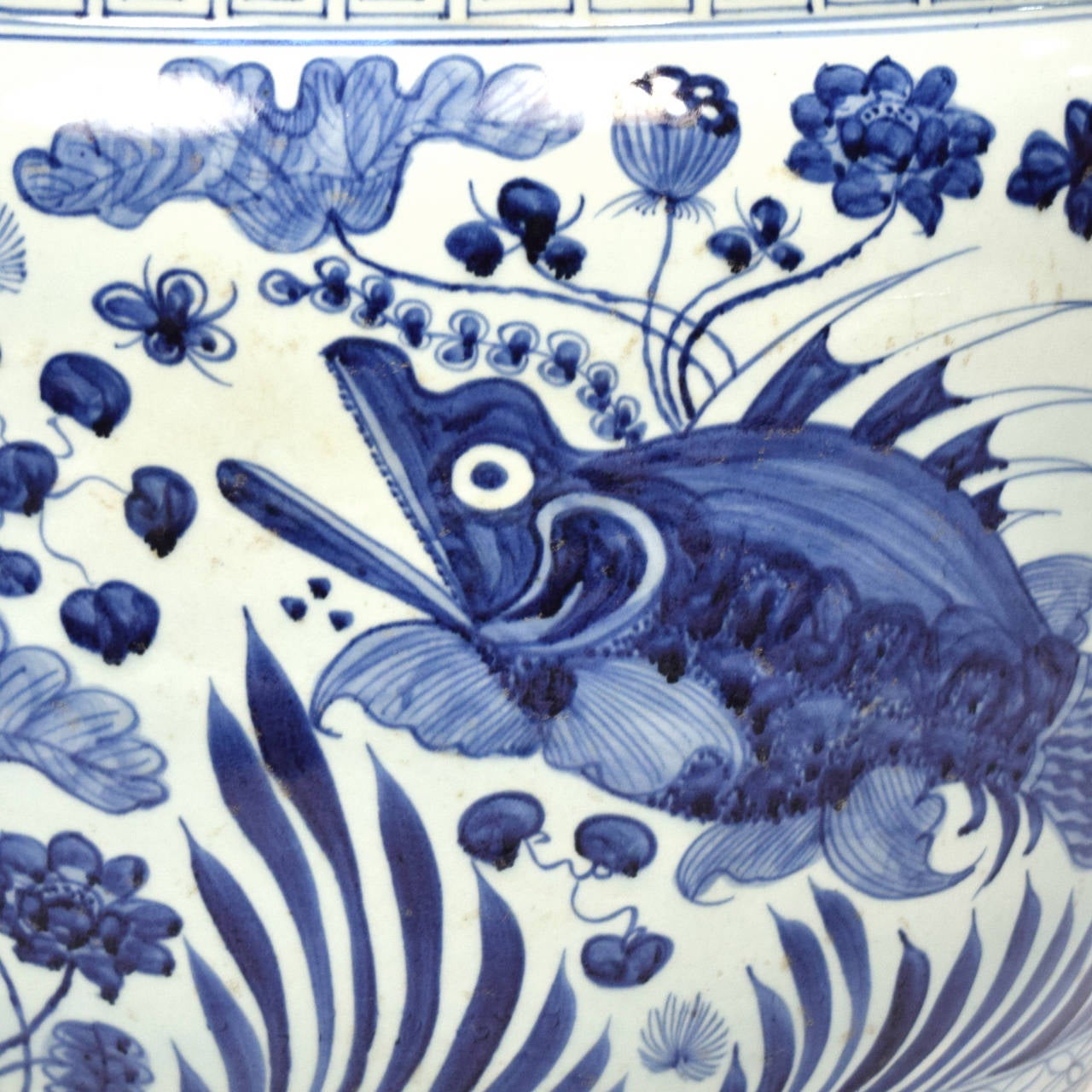 blue and white fish bowl