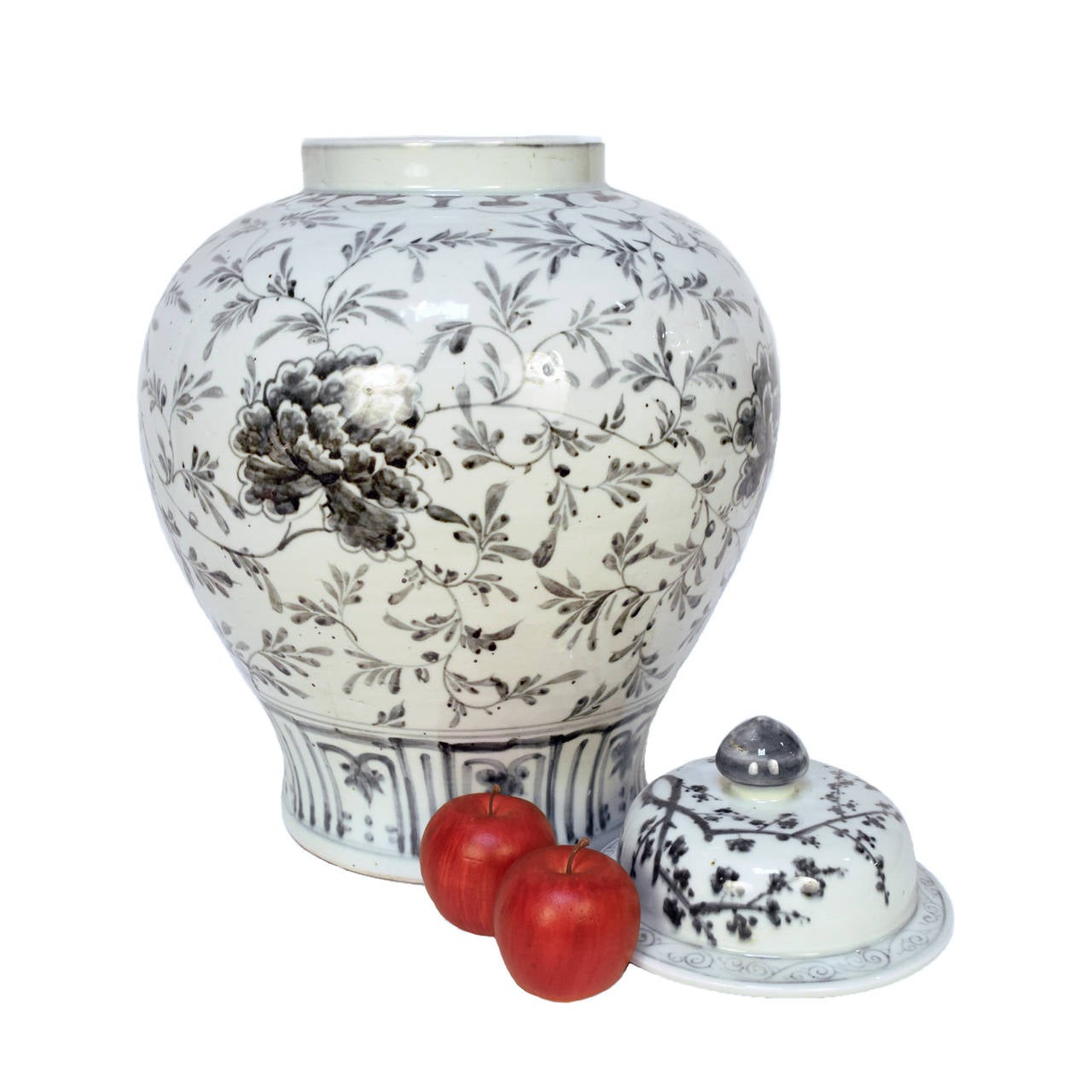 Ceramic jar with hand-painted charcoal color Shuo-yao (peony) flowers. In China, the peony is the “Queen of the Flowers” and an emblem of wealth and distinction.