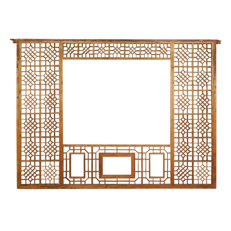 A grande early 20th century Chinese lattice window panel with multiple symbolic designs including the endless knot, and coin patterns.  

Pagoda Red Collection #:  BJB119G

Keywords:  Panel, wall hanging, lattice, painting, photograph,