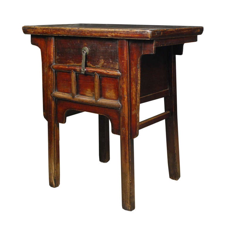 A lovely table from Shanxi Province, China. This Elmwood tables features a beautiful patina and one drawer with brass hardware.

Pagoda Red Collection # BJB031