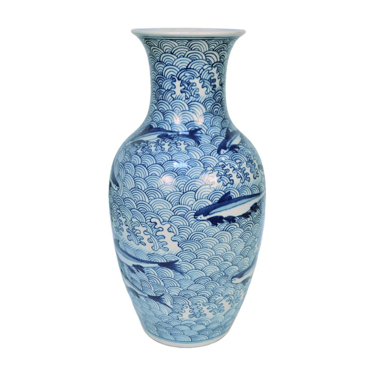 Blue and white vase with unusual fish and wave motif.