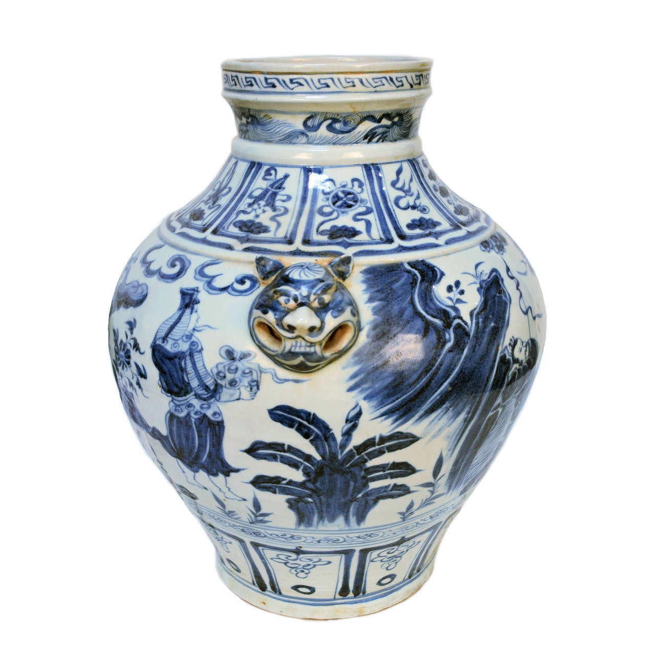 Blue and White painted porcelain vase depicting scholar figures and botanical themes with usual animal head handles.