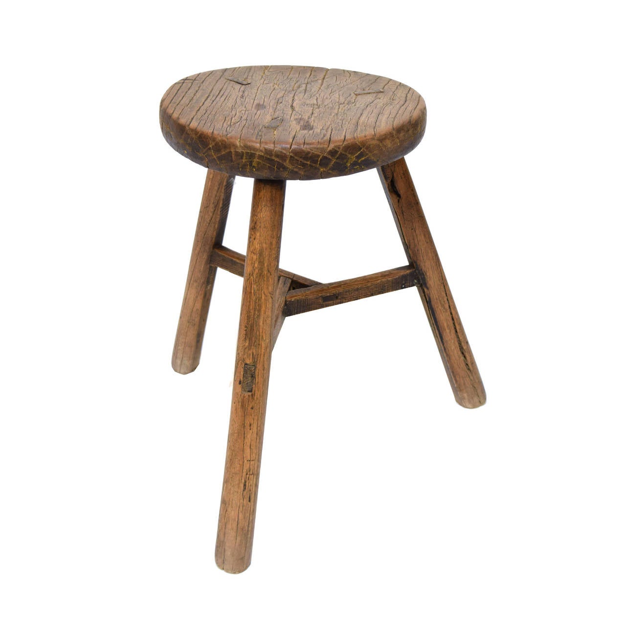 A round top stool with three legs from Northern China made of Chinese northern elm, circa 1850.
