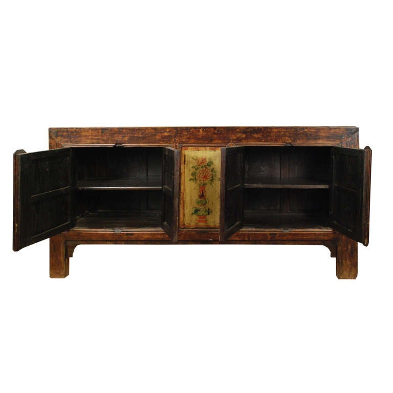 A 19th century Mongolian Elmwood coffer with four doors painted with vases with auspicious flowers.

Pagoda Red collection #:  BJB059

Keywords:  Console, sofa table, sideboard, buffet, server, credenza
