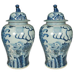Pair of Chinese Blue and White Covered Jars with Qilin