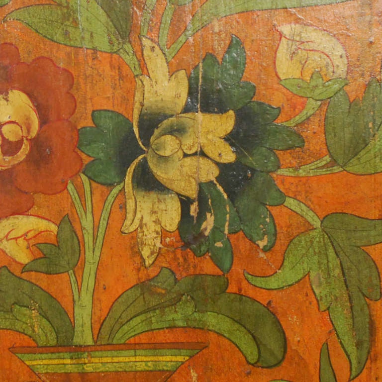 A vintage, mid-20th century, Tibetan door panel painted with a vase with peony blossoms and lotus flowers.

Pagoda Red Collection #:  DVDD077C

Keywords:  Door, panel, painting, wall hanging, art, artwork, photograph