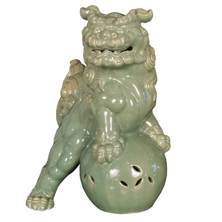 A lovely pair of Japanese celadon green fu dogs. Usually depicted in pair, fu dogs are guardian figures traditionally seen outside of homes, palaces, and imperial tombs.

Pagoda Red Collection # CIG002