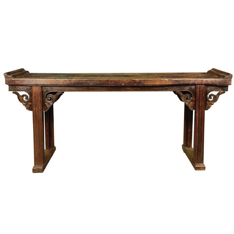 A 19th century Chinese Ironwood (tielemu) and Rosewood (huali) duban altar table with one solid plank top with everted ends, and scrolling vine spandrels.

Pagoda Red Collection #:  BJB012

Keywords:  Table, console, sideboard, buffet, server,