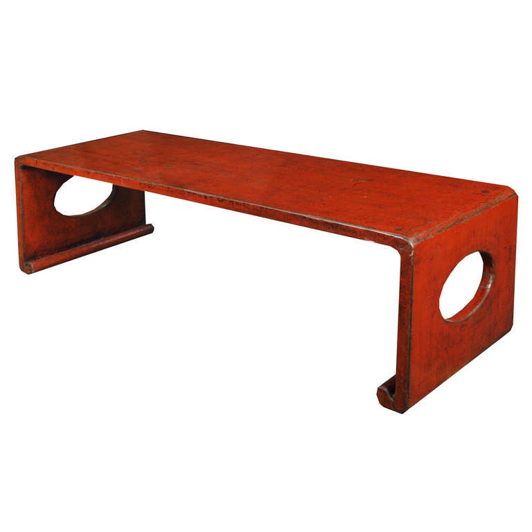 A 20th century Chinese red crackle lacquered low waterfall table with oval cut-out sides and scrolled feet.

Pagoda Red Collection #:  BJB003

Keywords:  Low table, coffee, cocktail, bench