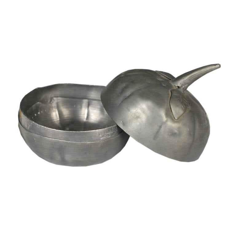 A lovely little pewter container from Southern China. This fruit shaped piece open at the middle and its from c. 1850