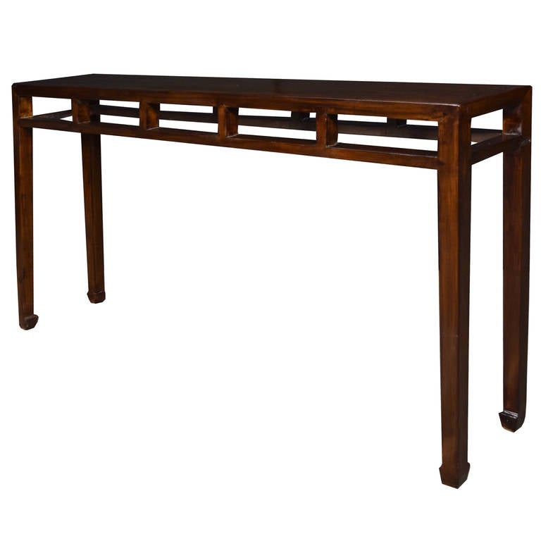 A stunning and simple shallow altar table from Northern China. This circa 1850 table is made of walnut and features hoofed feet and stretchers on all sides.

Pagoda Red Collection # BJC075